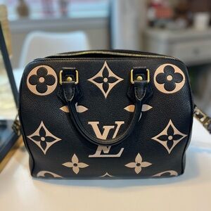 Speedy Bandouliere 25 Bicolor Noir Beige bag.